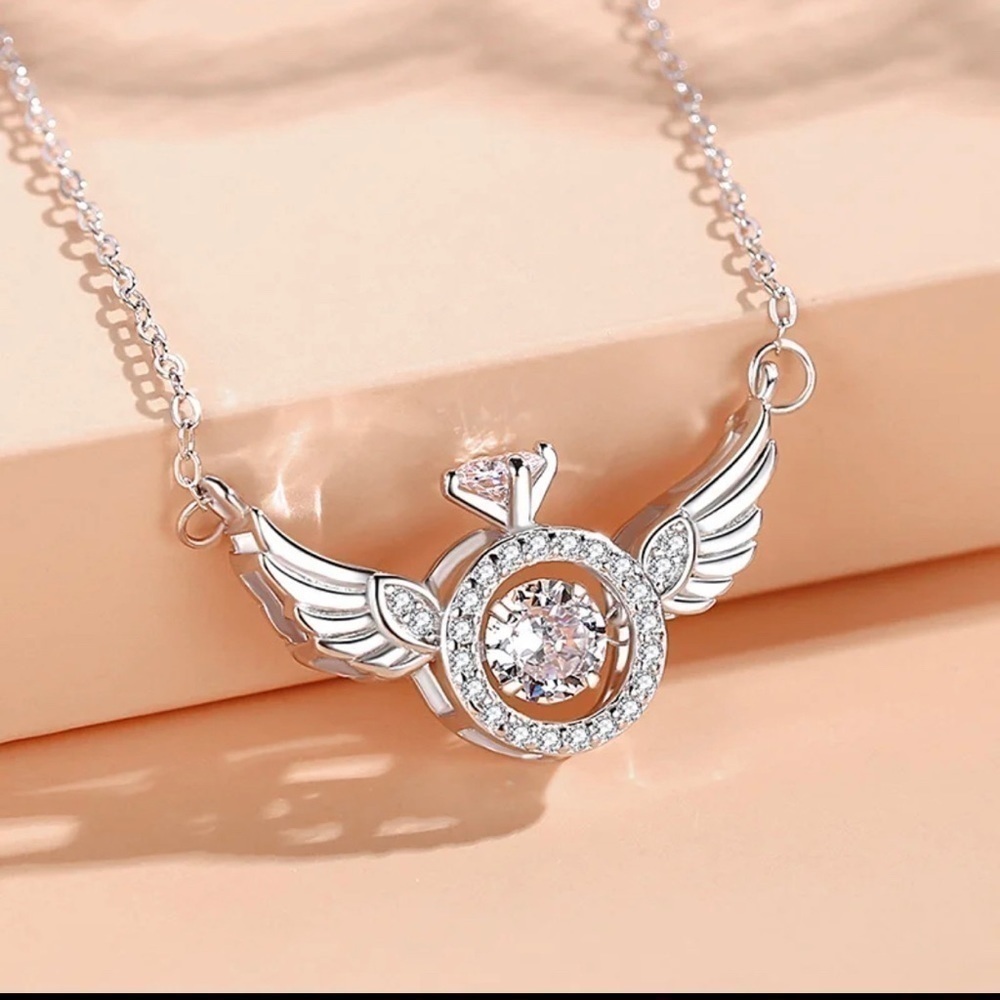 14K White Gold/ Rhodium Plated Diamond In Motion Diamond Ring w/ Wings Necklace